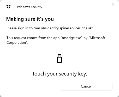 Prompt for signing into spine following selection of pass key as option for logging in