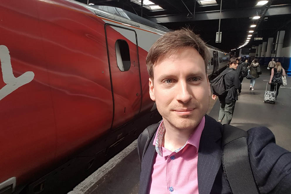 NHS Digital's Hadleigh Stollar on a train platform