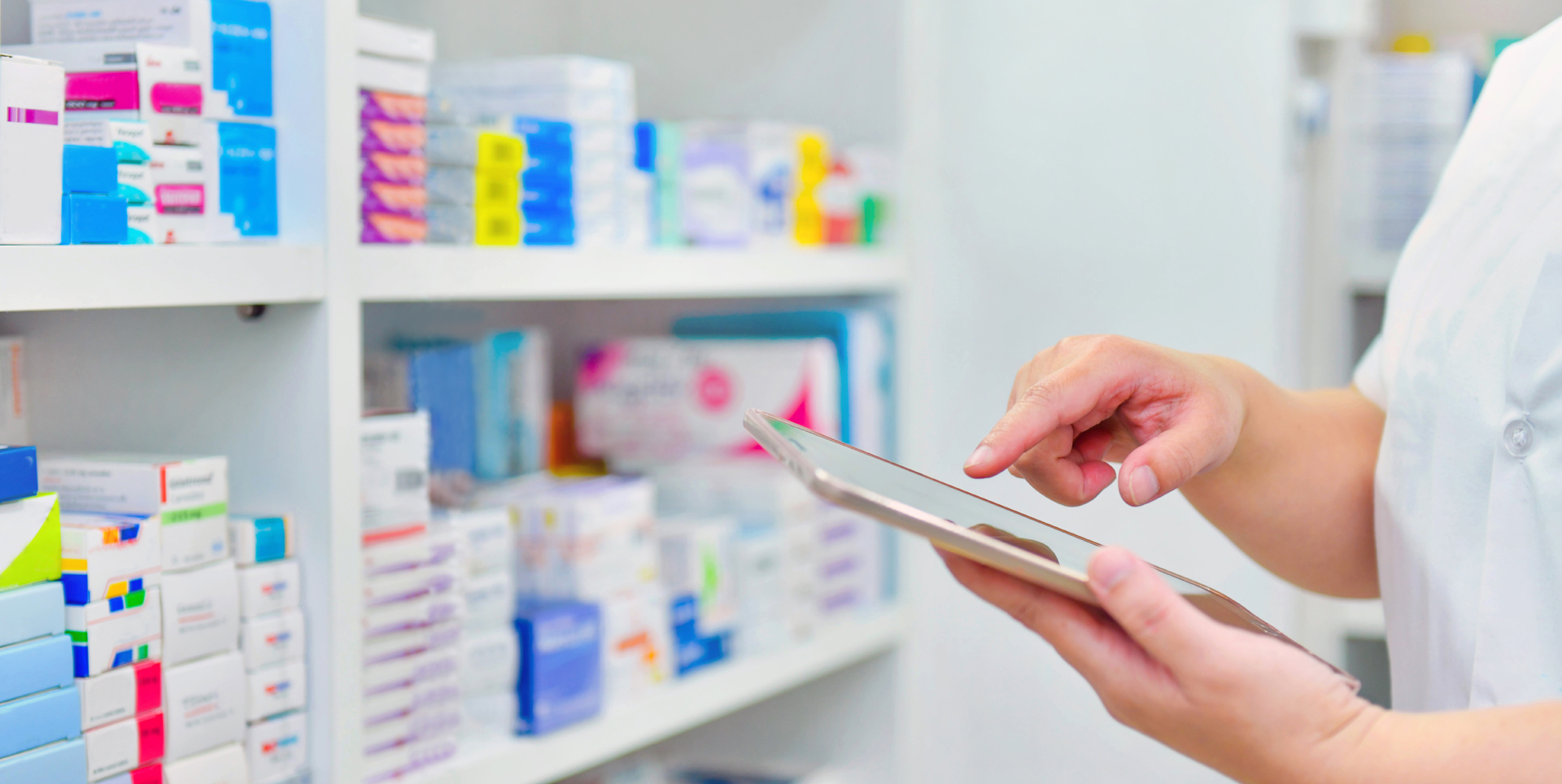 Image of pharmacist using digital device